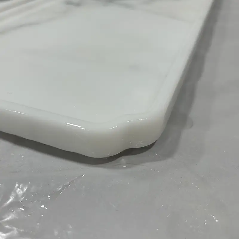 Piatto di marmo bianco calacatta